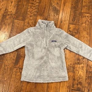Gray Patagonia fleece pole over